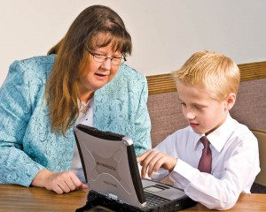 mormon-TeachingOnComputer